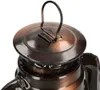A close-up of the top of an oil lamp. Voir les images du produit