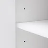 A close-up view of a white shelf with two small black holes drilled into the wall behind it. Produktbild-Vorschau