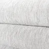A close-up view of a folded light gray carpet with a textured, flecked pattern. Anteprima dell’immagine prodotto