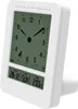 A white digital clock with a radio-controlled display showing the time, date, day, and temperature. Anteprima dell’immagine prodotto