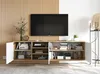 A TV stand with a TV and decorative items in a living room. Podgląd zdjęcia produktu