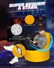A man is sitting on a yellow beanbag chair in a dimly lit room with screens in the background. Produktbild-Vorschau