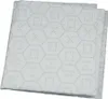 A stack of white, folded grease filter mats with a hexagonal pattern. Produktbild-Vorschau