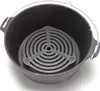 A black cast iron pot with a circular grate inside. Produktbild-Vorschau