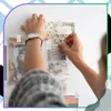 Mini clip autoadesive, porta foto e appunti trasparenti, 50 Anteprima dell’immagine prodotto 7
