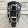 A close-up shot of a silver suitcase latch. Produktbild-Vorschau