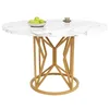 A round dining table with a marble-effect top and a geometric gold base, with a bowl of green apples and a small cup on top. Náhľad obrázku produktu