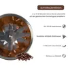Close-up view of a coffee grinder's blades with coffee beans and grounds, accompanied by marketing text highlighting features. Produktbild-Vorschau
