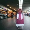 A shopping trolley in a supermarket aisle. Produktbild-Vorschau