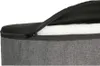 A close-up view of a pouf with its zipper partially open, revealing the white filling. Podgląd zdjęcia produktu