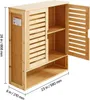 A wooden cabinet with two doors and shelves, shown against a white background with dimensions indicated. Voir les images du produit