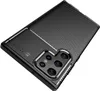 A close-up, angled view of a black smartphone case with a carbon fiber texture on the upper portion and a camera cutout on the lower portion. Produktbild-Vorschau