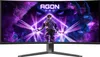 A futuristic gaming monitor displaying a vibrant, cosmic scene with a warrior character. Náhled obrázku produktu