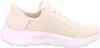 A side view of a single beige sneaker with a white sole. Náhľad obrázku produktu