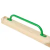A green metal handle attached to a wooden beam, isolated on a white background. Náhled obrázku produktu