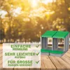 A product image with text overlays, set against a blurred outdoor background. Produktbild-Vorschau