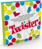 The image shows the packaging of the Twister board game, featuring colorful dots and game-related icons. Náhled obrázku produktu