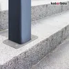 A close-up view of a metal post base attached to concrete steps. Produktbild-Vorschau