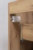 Close-up of a cabinet drawer slide mechanism on a wooden cabinet. Náhľad obrázku produktu
