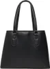A black leather tote bag is shown against a white background. Produktbild-Vorschau