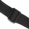 A close-up shot of a black strap with a black buckle, likely from a bag or rucksack. Anteprima dell’immagine prodotto