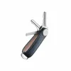 A navy leather key organizer with silver keys extended. Náhľad obrázku produktu