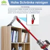 A red vacuum cleaner extension wand with a silver elbow joint is shown cleaning the top of a bookshelf. Voir les images du produit