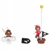 A collection of Super Mario figures including a winged Goomba on a cloud, a Bullet Bill, and a red-suited Mario with a propeller hat standing on a platform with a flag. Produktbild-Vorschau