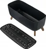 A black planter with wooden legs and a separate black insert tray. Voir les images du produit
