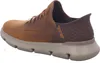 A side view of a brown Skechers slip-in sneaker against a white background. Voir les images du produit