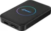A black Carlinkit TBOX LITE S device with a colorful circular logo on top. Produktbild-Vorschau
