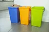Three recycling bins in different colors are lined up on a floor. Náhľad obrázku produktu