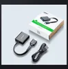 A product shot of a Ugreen HDMI to VGA converter and its packaging, along with a USB cable. Voir les images du produit