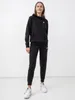 Nike W Nsw Club Flc Mr Pant Tight 010 Black/White L Podgląd zdjęcia produktu 10