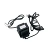 A black power supply unit with two cables, one with a plug and the other with a connector, is shown against a white background. Anteprima dell’immagine prodotto