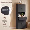 A tall, dark gray bathroom cabinet with open shelves and a drawer, placed in a tiled bathroom. A close-up inset shows a wall mounting bracket for anti-tip safety. Náhľad obrázku produktu