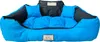 A blue and black dog bed with two small pillows on a white background. Náhled obrázku produktu