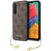 A phone case with a brown Guess logo pattern and gold charms is shown, with a phone screen visible inside. Podgląd zdjęcia produktu