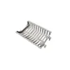 A metal fireplace grate on a white background. Produktbild-Vorschau