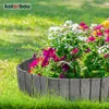 A close-up of a garden border made of wooden planks surrounding a colorful flower bed. Náhled obrázku produktu