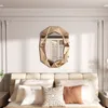 A bedroom scene with a large, decorative mirror above a bed. Produktbild-Vorschau