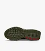 The bottom view of a green Nike Air Max Dn sneaker. Produktbild-Vorschau