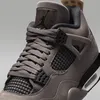 Close-up view of a Nike Air Jordan 4 Retro sneaker. Náhled obrázku produktu