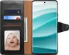 A flip-style phone case with a smartphone inserted, showing a baby's photo and cards inside. Náhled obrázku produktu