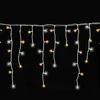 A string of icicle lights against a black background. Produktbild-Vorschau