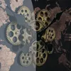 A close-up view of a clock with visible gears and a world map background. Anteprima dell’immagine prodotto