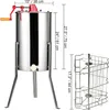 A stainless steel honey extractor with dimensions indicated by measurement lines and text. Podgląd zdjęcia produktu