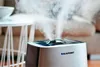 A Blaupunkt humidifier emitting mist in a living room setting. Produktbild-Vorschau