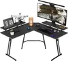 A black L-shaped gaming desk with a monitor, keyboard, mouse, drone, tablet, and lamp. Náhled obrázku produktu