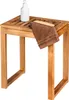 A wooden stool with a soap dispenser and a towel on top. Produktbild-Vorschau